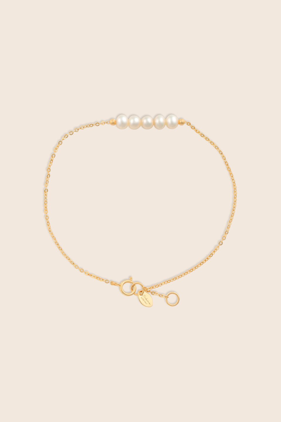 Lavita yellow gold bracelet with five stacked pearl beads