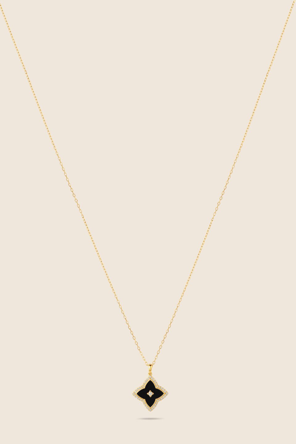 Amara yellow gold diamond necklace with black onyx